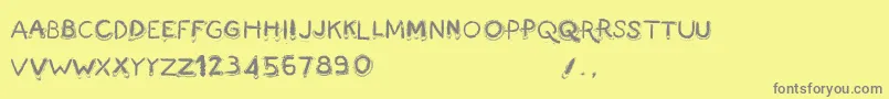 FingermadeV2-Schriftart – Graue Schriften auf gelbem Hintergrund