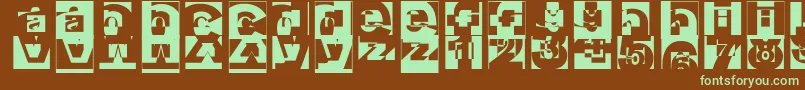フォントBrokat – 緑色の文字が茶色の背景にあります。