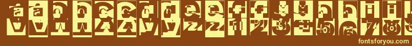 Brokat-fontti – keltaiset fontit ruskealla taustalla