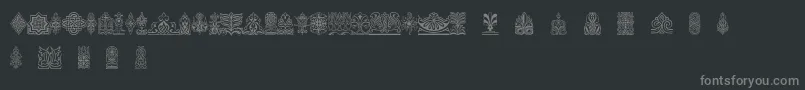 Henmanpictone-fontti – harmaat kirjasimet mustalla taustalla