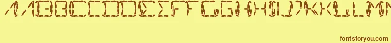 フォントMinimalGauge – 茶色の文字が黄色の背景にあります。