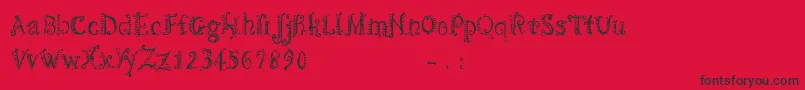 フォントCfspiralityRegular – 赤い背景に黒い文字