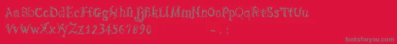 フォントCfspiralityRegular – 赤い背景に灰色の文字