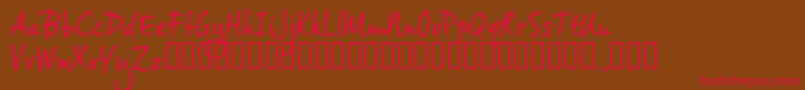 Vh2trial-Schriftart – Rote Schriften auf braunem Hintergrund