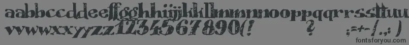 Scrubble-Schriftart – Schwarze Schriften auf grauem Hintergrund