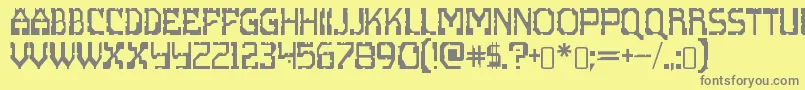 Fonte ScritzyxRegular – fontes cinzas em um fundo amarelo