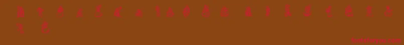 Macumbat Font – Red Fonts on Brown Background