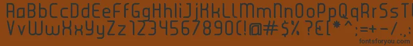 JuiceRegular-Schriftart – Schwarze Schriften auf braunem Hintergrund