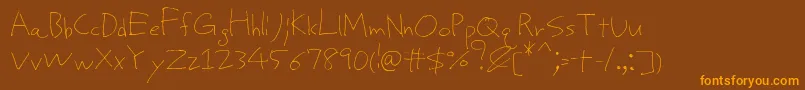 ProtoUncertain Font – Orange Fonts on Brown Background