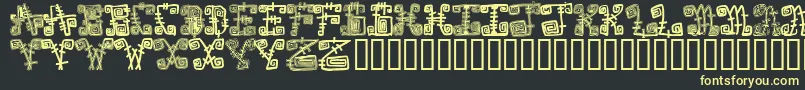 フォントSpazzzcaps – 黒い背景に黄色の文字
