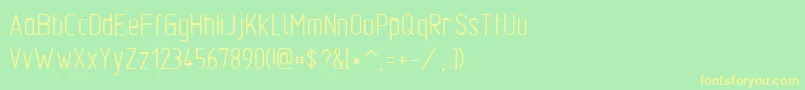 フォントTgl310341 – 黄色の文字が緑の背景にあります