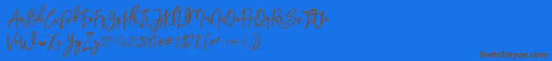 BloomyScriptFree-Schriftart – Braune Schriften auf blauem Hintergrund