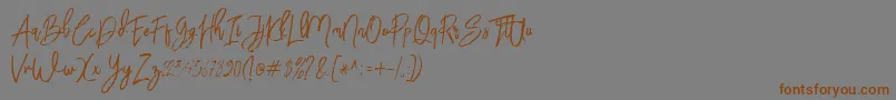 BloomyScriptFree Font – Brown Fonts on Gray Background