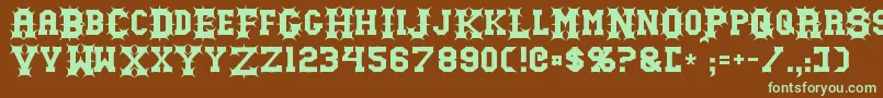 Gutcruncher Font – Green Fonts on Brown Background