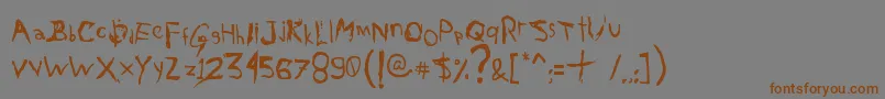 Шрифт AxelGilbyScranggler – коричневые шрифты на сером фоне