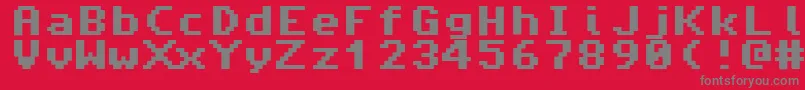 Fonte Amiga4ever – fontes cinzas em um fundo vermelho