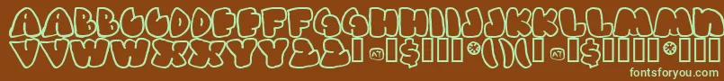 フォントGashp – 緑色の文字が茶色の背景にあります。