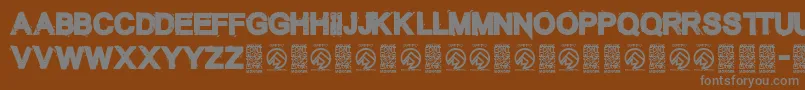 Saiba mais sobre a fonte TheunknownRegular Fonte TheunknownRegular – fontes cinzas em um fundo marrom