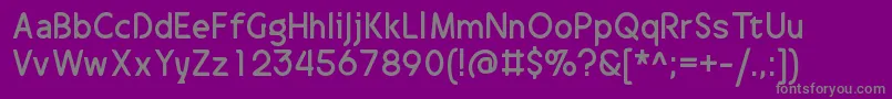 DrakalligroOriginal Font – Gray Fonts on Purple Background