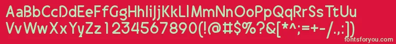 DrakalligroOriginal Font – Green Fonts on Red Background