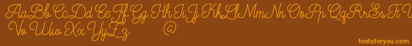 Mooglonk Font – Orange Fonts on Brown Background