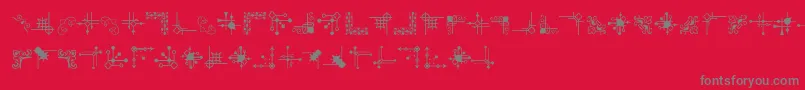 CornpopFour-Schriftart – Graue Schriften auf rotem Hintergrund