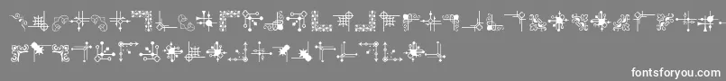 フォントCornpopFour – 灰色の背景に白い文字