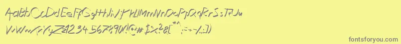 フォントXaligraphyThinitalic – 黄色の背景に灰色の文字