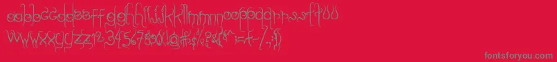 Dilate-fontti – harmaat kirjasimet punaisella taustalla