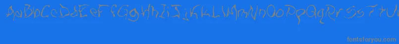 ZillOWisp-Schriftart – Graue Schriften auf blauem Hintergrund