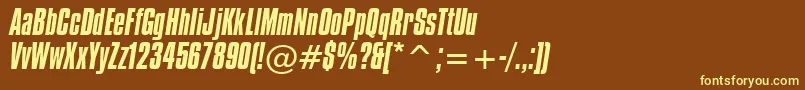 CompactaItalicBt-fontti – keltaiset fontit ruskealla taustalla