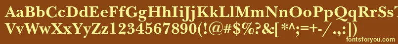 NewbaskervillecBold-fontti – keltaiset fontit ruskealla taustalla