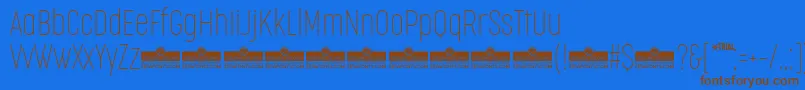 CocogooseCompressedThinTrial Font – Brown Fonts on Blue Background