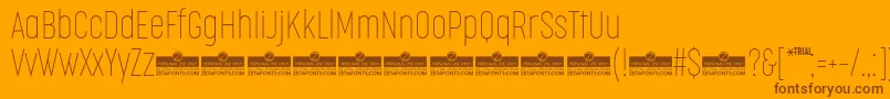 フォントCocogooseCompressedThinTrial – オレンジの背景に茶色のフォント