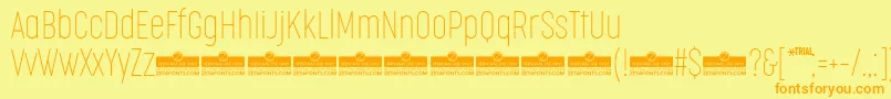 CocogooseCompressedThinTrial Font – Orange Fonts on Yellow Background