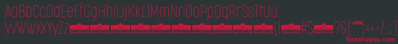 Шрифт CocogooseCompressedThinTrial – красные шрифты на чёрном фоне
