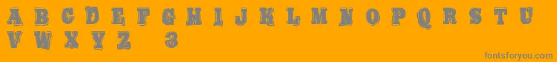 BoldPressingH3Demo-fontti – harmaat kirjasimet oranssilla taustalla