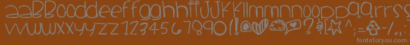 フォントSantacruz – 茶色の背景に灰色の文字