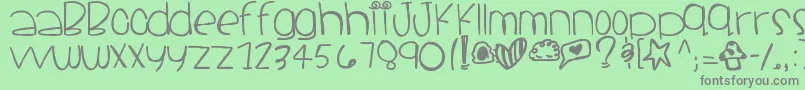 フォントSantacruz – 緑の背景に灰色の文字
