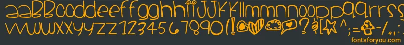 Santacruz-Schriftart – Orangefarbene Schriften auf schwarzem Hintergrund