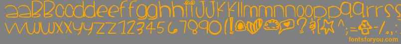 フォントSantacruz – オレンジの文字は灰色の背景にあります。
