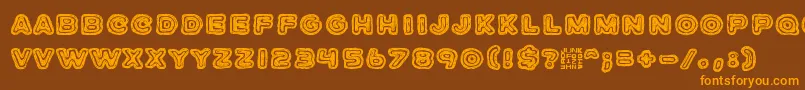 JazzZebra-Schriftart – Orangefarbene Schriften auf braunem Hintergrund