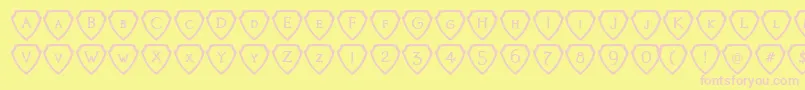 KnightsQuestShielded Font – Pink Fonts on Yellow Background