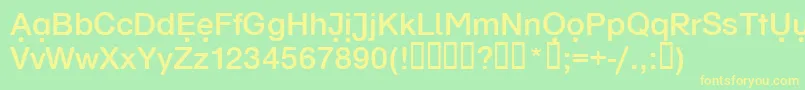 Schulvokaldots-Schriftart – Gelbe Schriften auf grünem Hintergrund