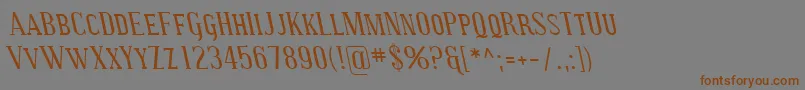 SfcovingtonscrevItalic-Schriftart – Braune Schriften auf grauem Hintergrund