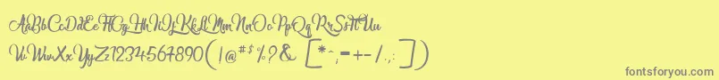 フォントMarguaritas – 黄色の背景に灰色の文字
