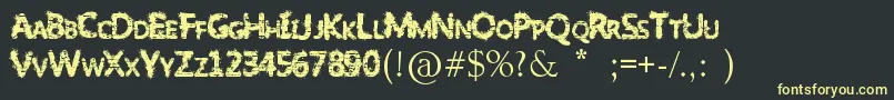 SlumlordEviction Font – Yellow Fonts on Black Background