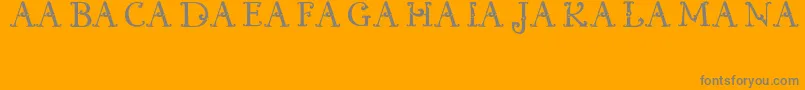 KualamanpaFont-Schriftart – Graue Schriften auf orangefarbenem Hintergrund
