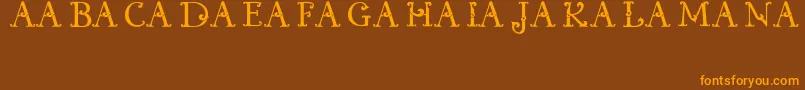 KualamanpaFont Font – Orange Fonts on Brown Background