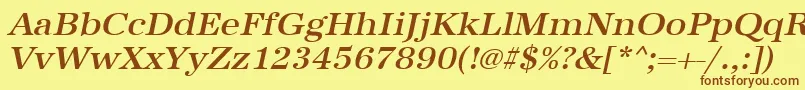 UrwantiquatmedwidOblique Font – Brown Fonts on Yellow Background